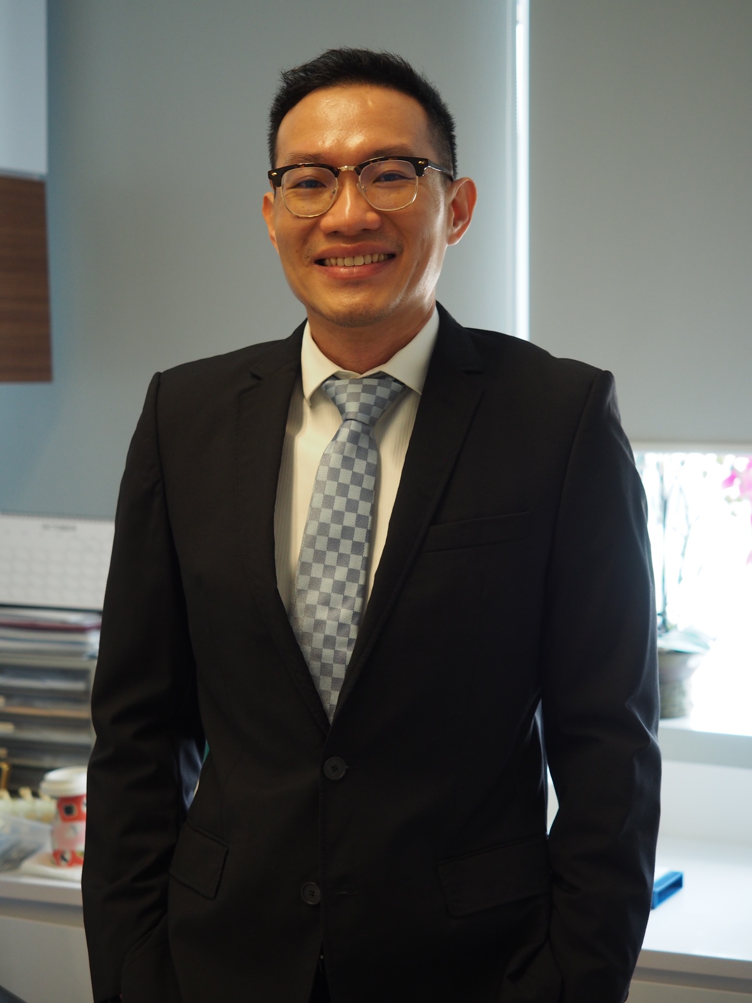Dr Tan Chyn Hong in a suit